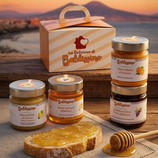 Cofanetto delle dolcezze Baldissimo con marmellata di limoni, marmellata di arance, confettura di uva aglianico e miele millefiori con il Vesuvio sullo sfondo